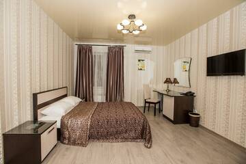 Фото номера Номер комфорт с 1 двуспальной кроватью Гостиница Lotus Hotel &amp; Spa г. Саратов 2