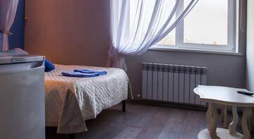 Фото номера Двухместный номер Делюкс с 1 кроватью и душем Гостиница Рай г. Саратов 2