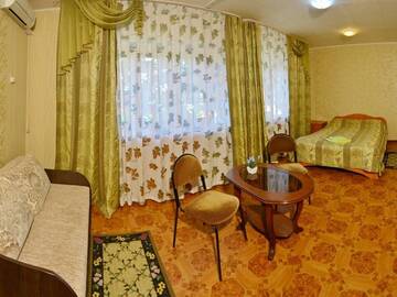 Фото номера Номер стандарт с 1 двуспальной кроватью и диваном Гостиница На Кузнечной г. Саратов 10