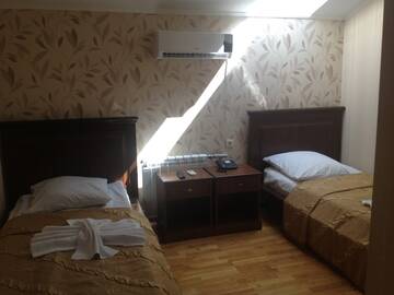 Фото номера Эконом двухместный Twin с удобствами на этаже Гостиница Загородный комплекс Автокемпинг г. Саратов 2